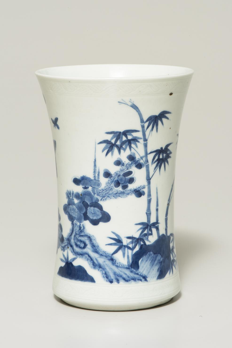 White vase decorated with plum, bamboo, and pine all in shades of blue