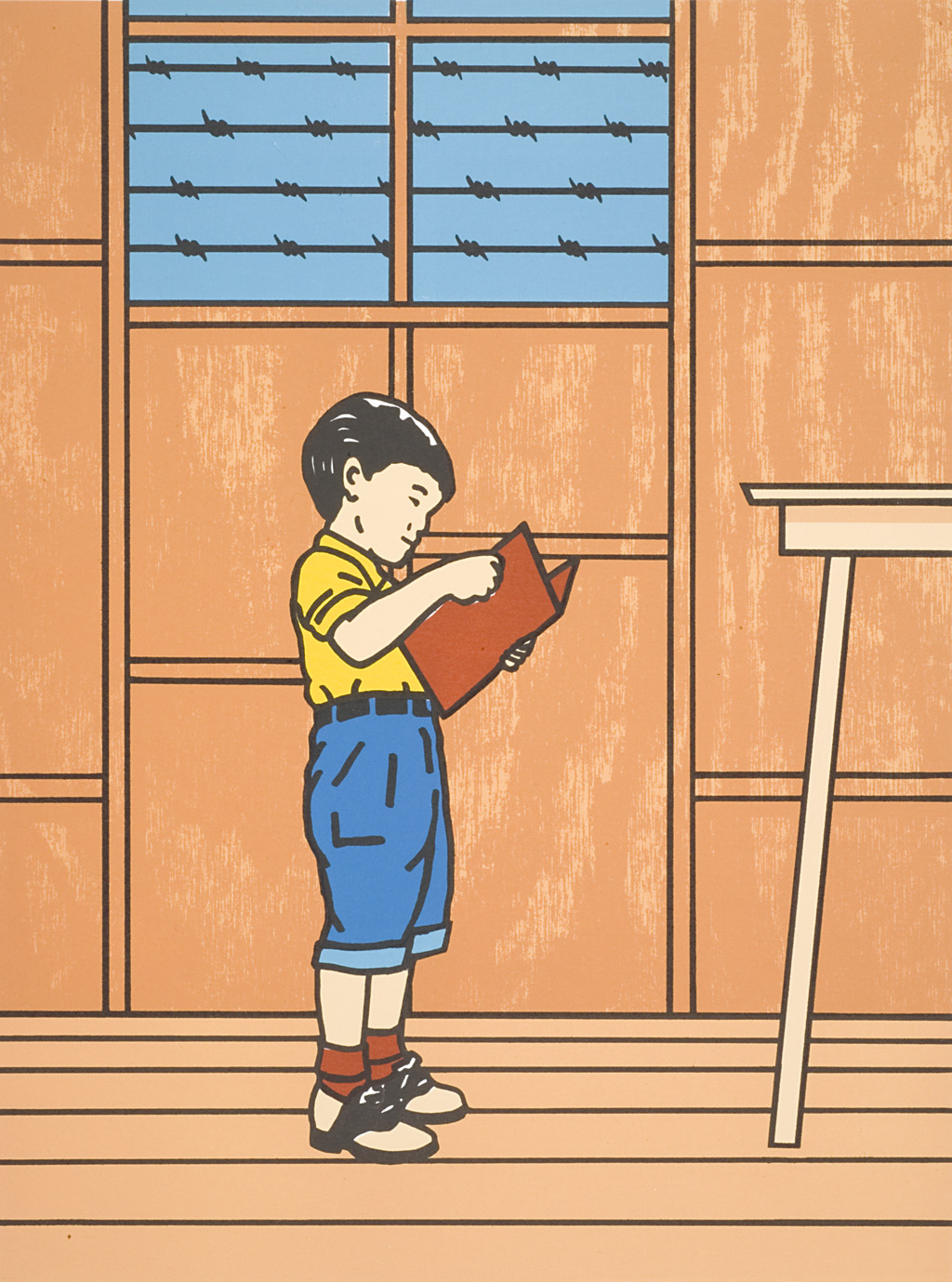 A child with dark hair, a yellow short and blue shorts stands in the center of a room and reads a red book. He faces a table in the room.  Above him is a window, outside of which barbed wire can be seen.