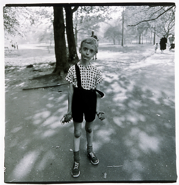 Diane Arbus, Exasperated boy with a toy hand grenade, N.Y.C.