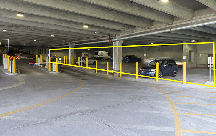 A yellow box outlines a section of a parking garage