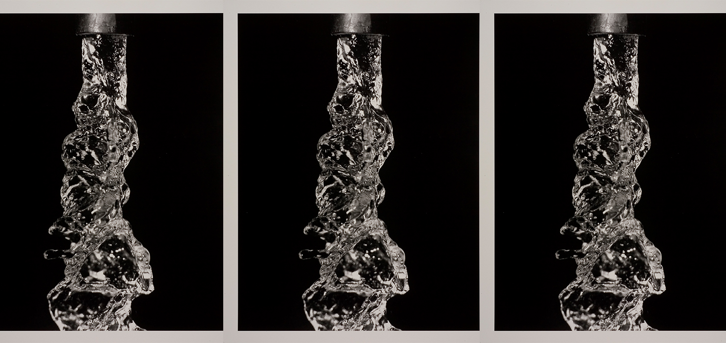 Black and white photo of water pouring down from a faucet repeated three times