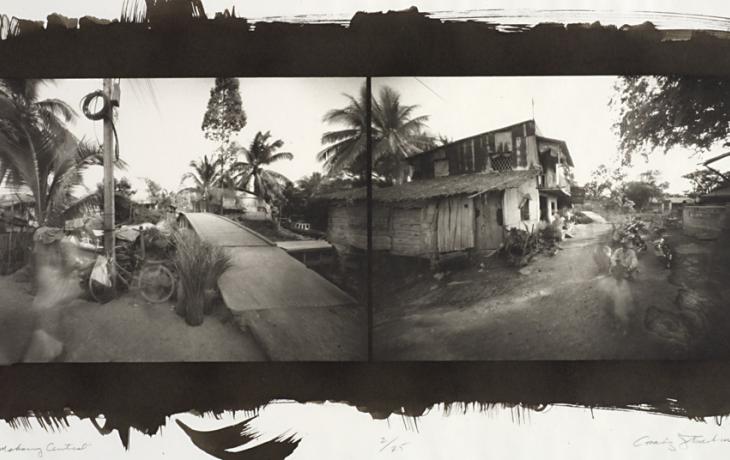 Diptych of Vietnam village. Left image: wooden bridge, bicycle, shacks, and palm trees. Right image: shacks along narrow dirt road with man working in foreground.