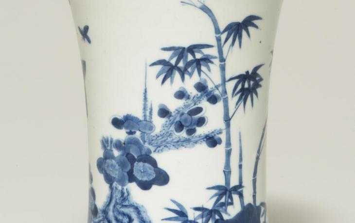 White vase decorated with plum, bamboo, and pine all in shades of blue
