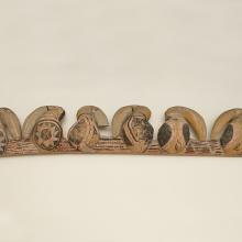 <a href="https://spencerartapps.ku.edu/collection-search#/object/31785" target="_blank"><i>portion of a lintel with hornbill birds</i> by Abelam peoples</a>