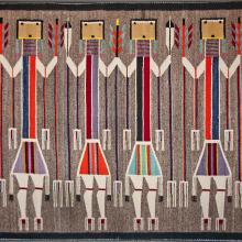 <a href='https://spencerartapps.ku.edu/collection-search#/object/42594' target='_blank'><i>yei rug,</i> unrecorded Diné (Navajo) artist</a>