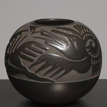 <a href='https://spencerartapps.ku.edu/collection-search#/object/39316' target='_blank'><i>bowl with Avanyu design</i> by Camilio Tafoya</a>
