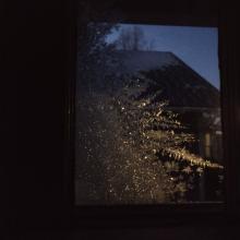 "Frosty window overlooking neighboring house on Massachusetts Street." — Ann Snow