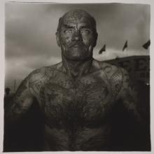 <a href='https://spencerartapps.ku.edu/collection-search#/object/15636' target='_blank'><i>Tattooed Man at a Carnival, Md.</i> by Diane Arbus</a>