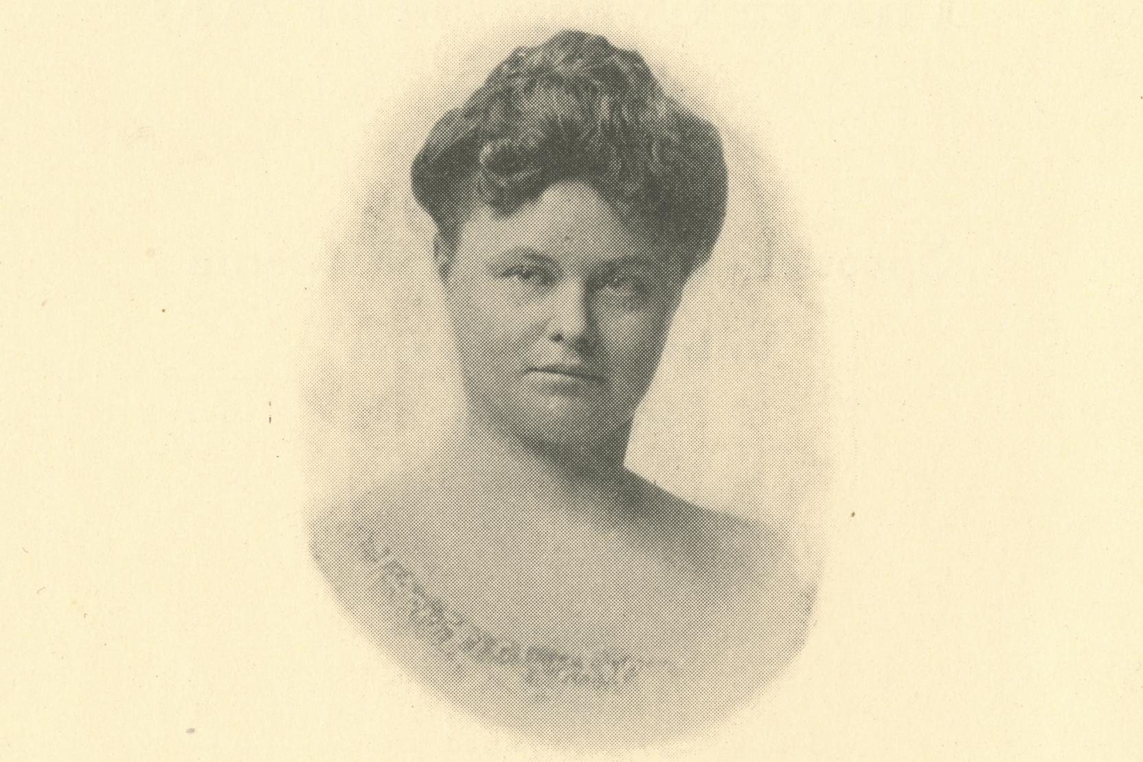 Sepia vintage portrait of a white woman with her hair pulled up; she stares sternly at the camera