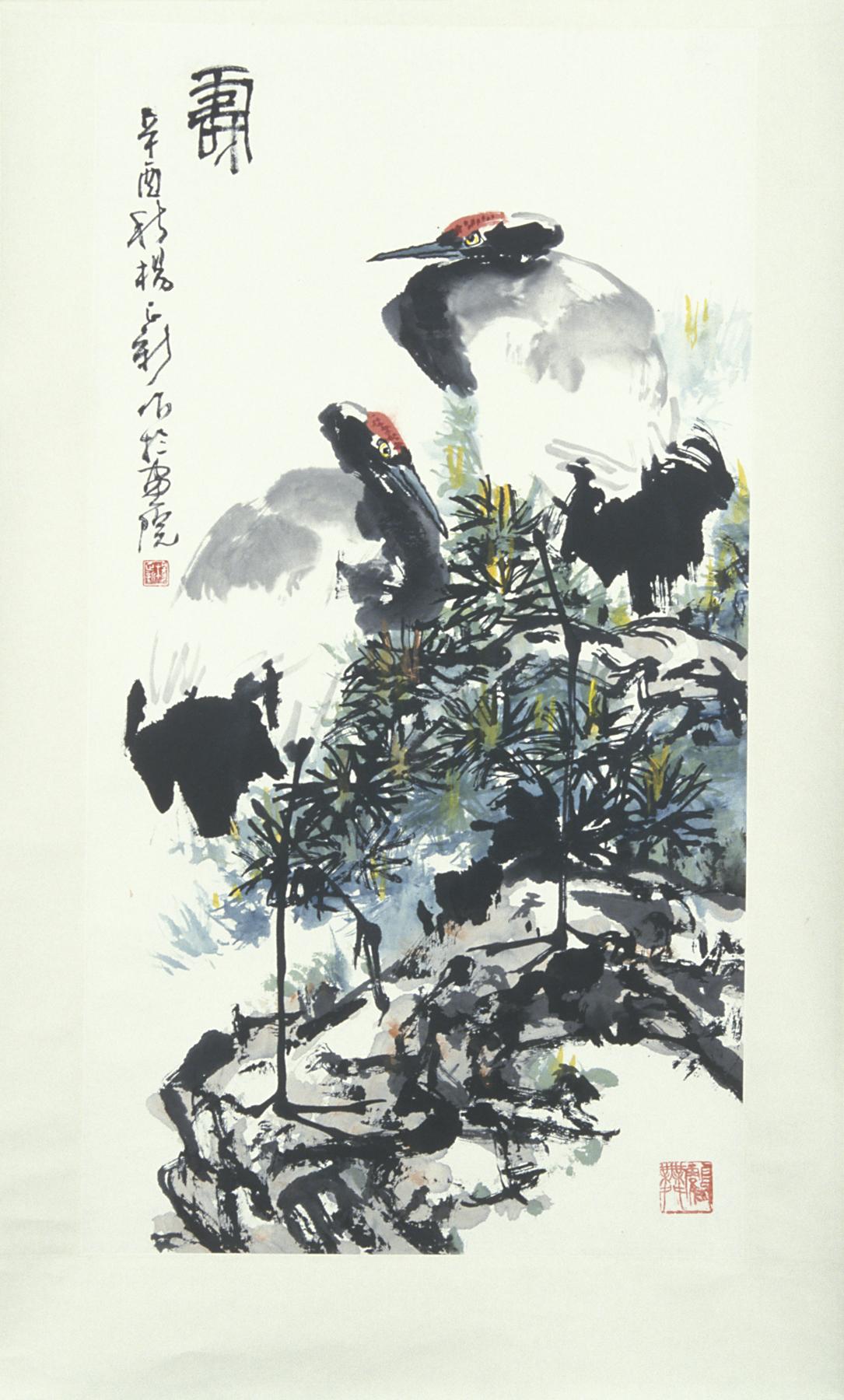 Ink painting of two cranes standing on pine branches, Chinese characters line the left of the painting