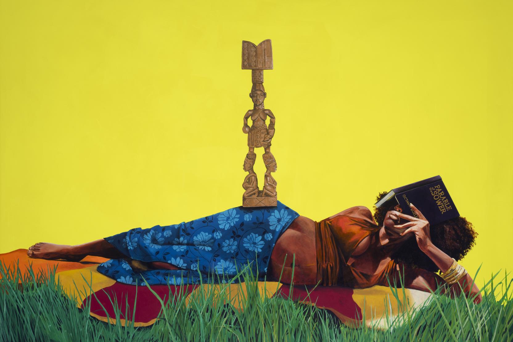 A pregnant Black woman reclines on a blanket in the grass; she covers her face with a book titled “Parable of the Sower” and a statue of a god-like figure balances on her hip