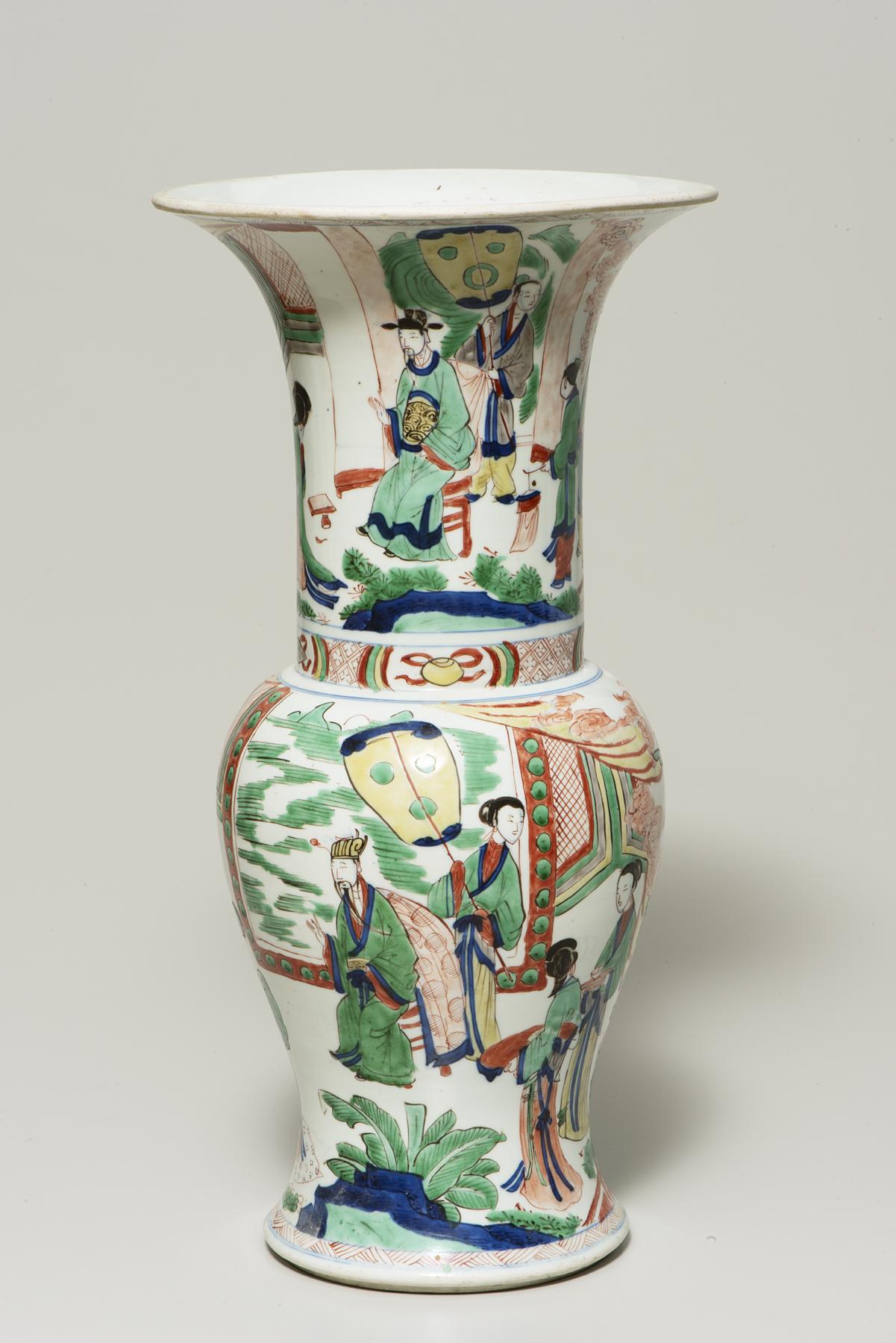 tall white vase with a wide rim; two separate garden scenes with figures decorate the top and bottom sections